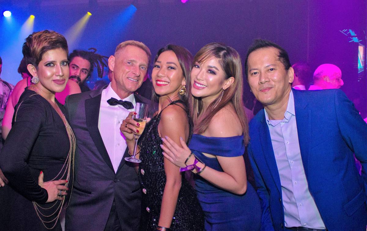 Party Of The Decade: Winner of the Formula One 2018 Singapore Grand Prix, Lewis Hamilton, Celebrates at The Podium Lounge Singapore