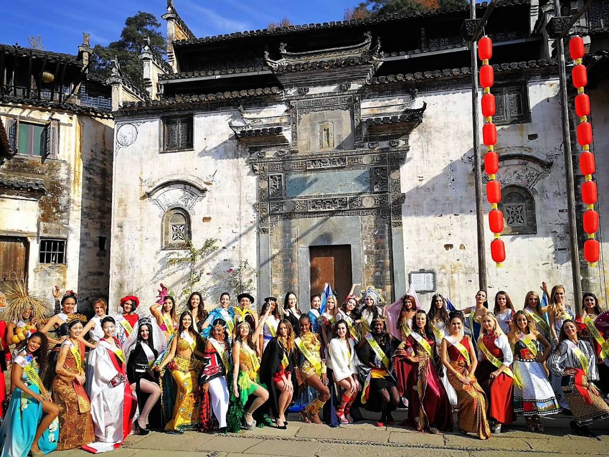 Miss Tourism Queen of the Year International Tour Lands in Chinese Village 